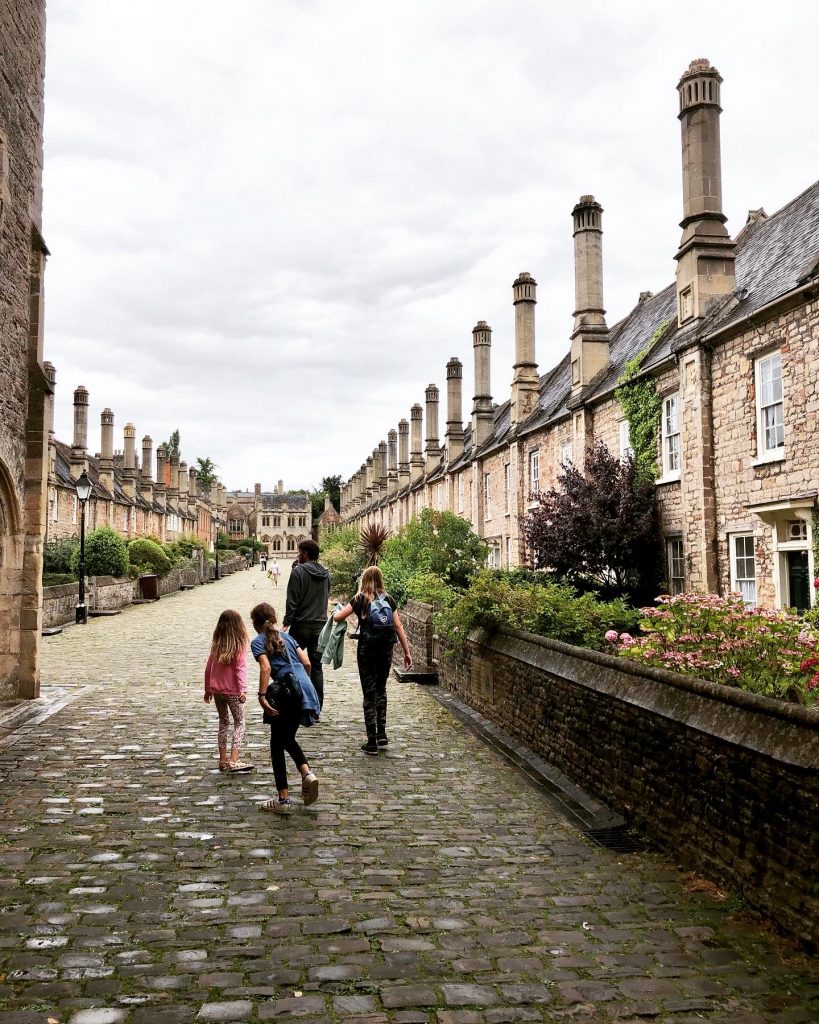 Walking along Vicar's Close in Wells