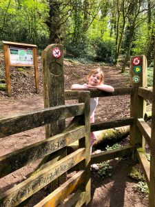 Girl at the entrance to Weston Big Wood in Portishead