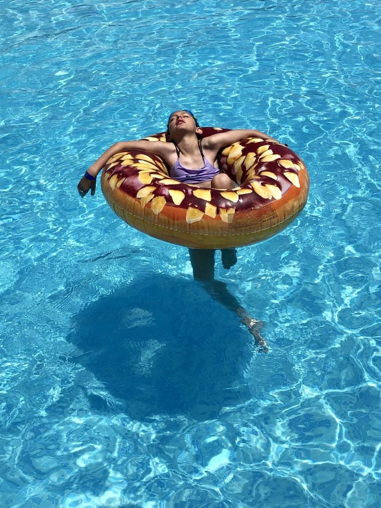 Girl in outdoor pool in Somerset